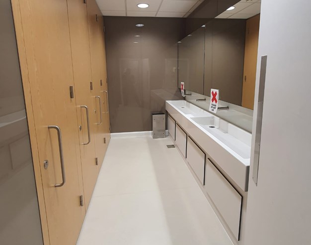 venesta-washrooms-veneer-toilet-cubicles-solid-surface-washtrough-citibank-data-centre